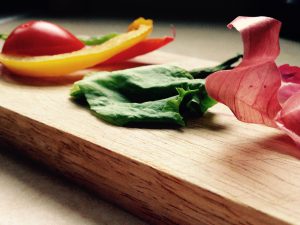 several veggies on a wooden board