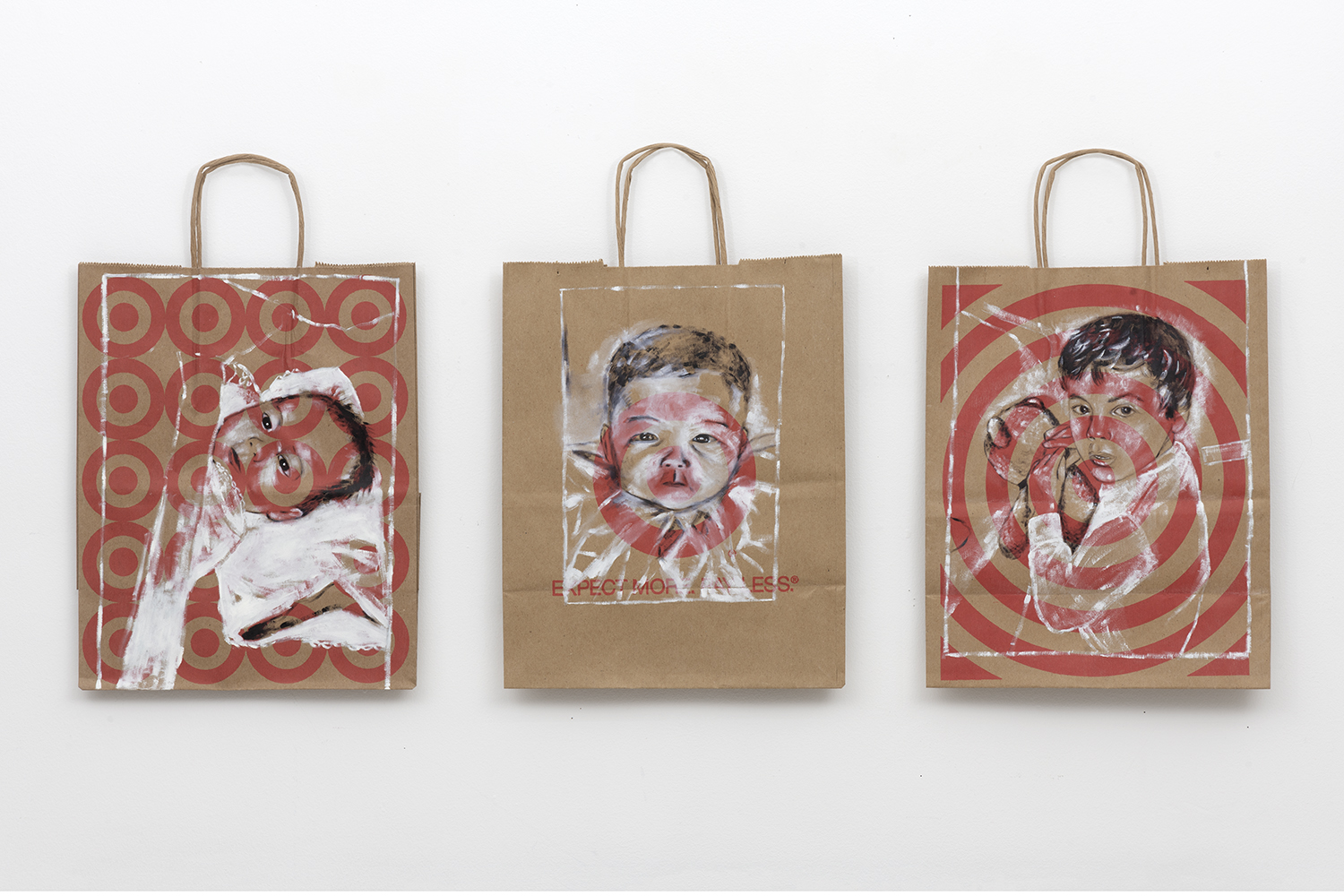 Babies painted on 3 Target grocery bags