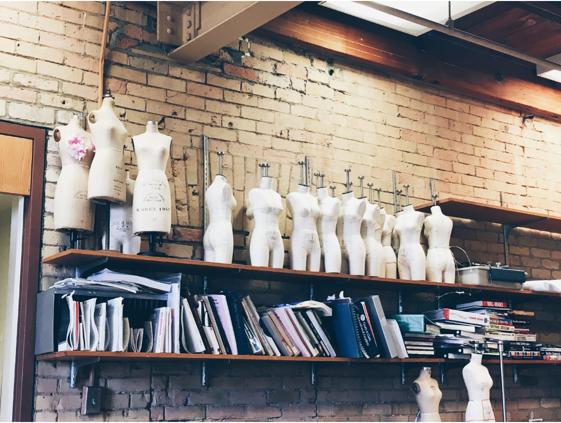 mannequin torsos on a shelf