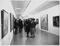 crowd of people looking at art