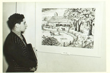 A person looking at a painting