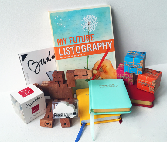 My Future Listography by Lisa Nola ($16.95), Fortune-Telling Books ($9.95), Kikkerland Cloud Eraser ($4.50), Cubebot ($8.50-$16.95).