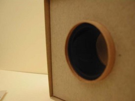 cardboard box with circular hole