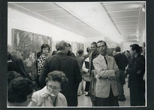 A crowd of people in a hall