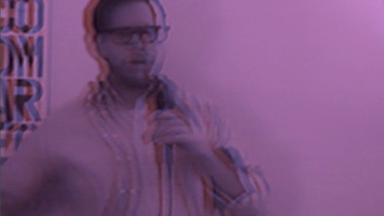 blurry purple image of a person