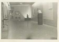 a hall with artwork on display
