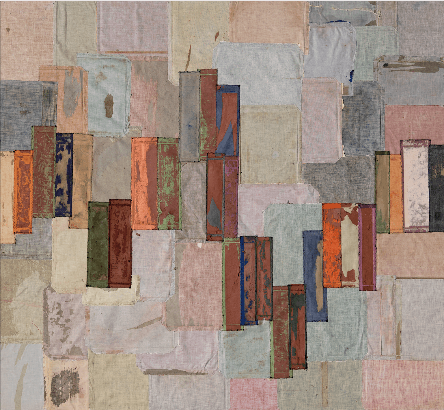 patchwork of fabrics and paints