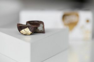 a broken piece of chocolate 