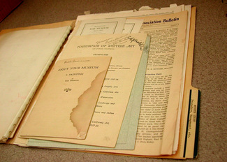 Several aged folders