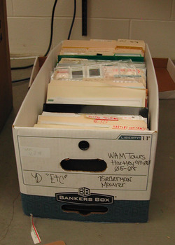 A box full of paper folders