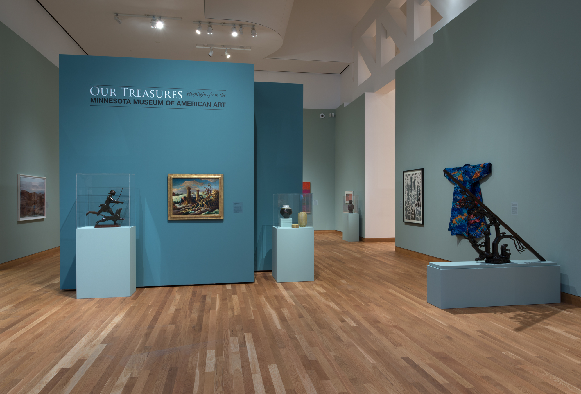 gallery with paintings and scultpures on display