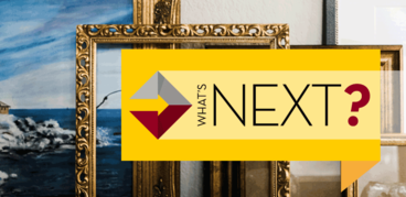 What's NEXT logo in front of painting frames