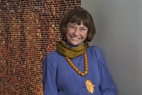 (1981 - 2020) Weisman Director and Chief Curator Lyndel King is pictured in a blue shirt, scarf and statement necklace at the museum