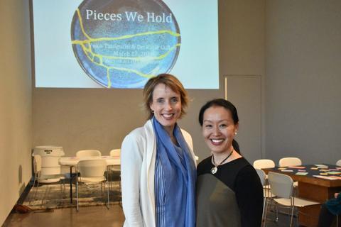 Arist Yuko Taniguchi and Dr. Kathryn Cullen pose for a portrait during the "Pieces We Hold" workshop.