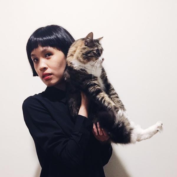 Helen Shewolfe Tseng holding their cat